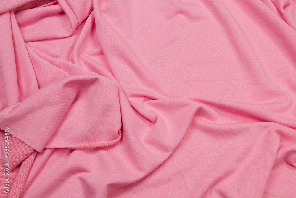 Fabric cotton fold, top view. Red textile Fabric cotton fold, top view. Red textile