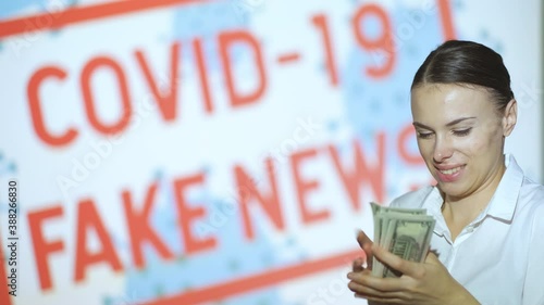 A beautiful girl gets money and profits, gets the latest information about the epidemic when she finishes the pandemic and lockdown, covid 19 fake news