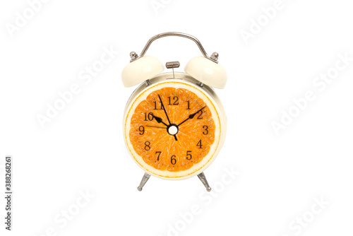 An alarm clock made of orange