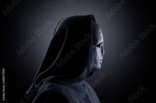  Portrait of a scary figure in hooded cloak