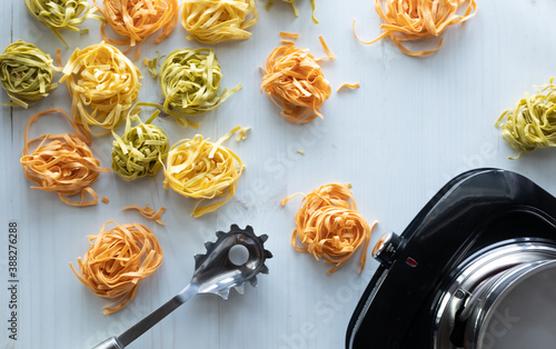 Top down view of fettuccine nests ready for cooking. photo