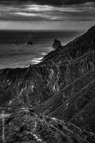 A black and white photo of the coastline in Tenerife.