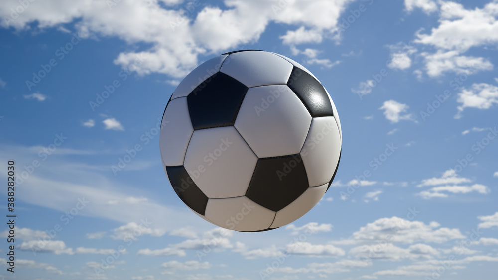 Close-up of a soccer ball in flight. The sky in the background.