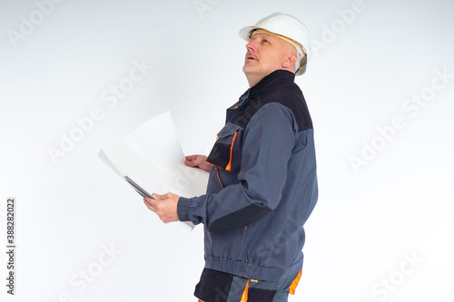 Man engineer with drawings ...