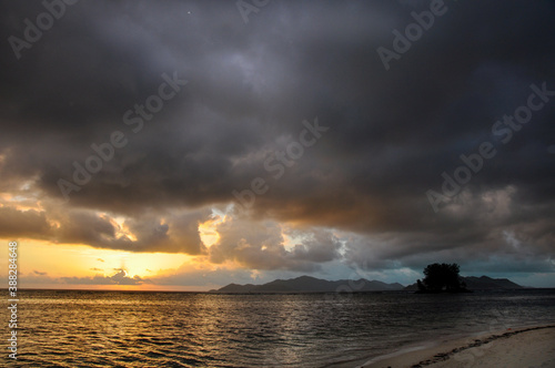 Dark clouds at sunset on the ocean © MF1688