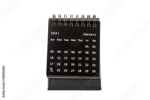 2021 January. Time planning, business, day counting and holidays. Paper calendar on a white table