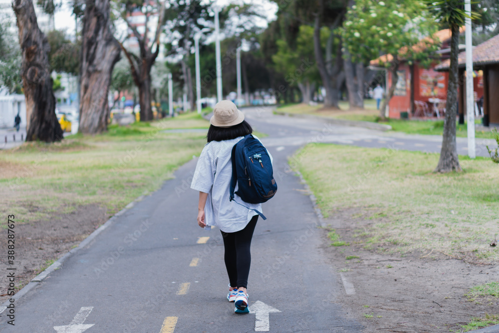 Fototapeta premium College student by the park.
