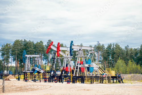 Fotografie Oil platform with oil pumping chairs.