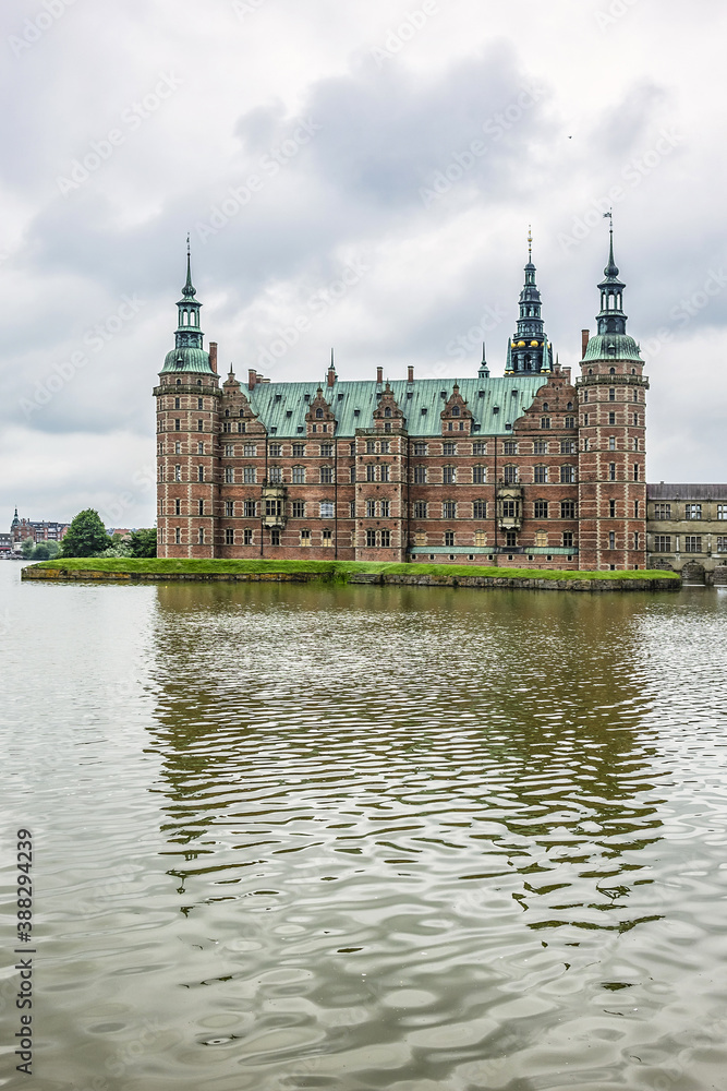 Naklejka premium Frederiksborg Castle (Frederiksborg Slot, XVII century) - palace in Hillerod, Denmark. Castle built as royal residence for King Christian IV of Denmark-Norway.