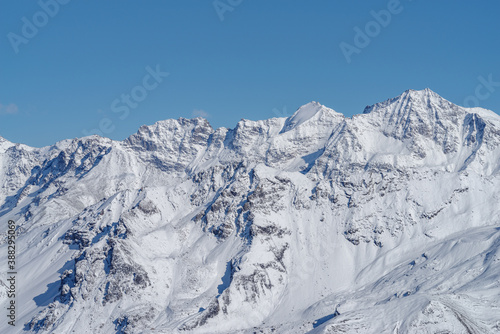 Scenic view of snowcapped mountains against sky © Dmytro Surkov