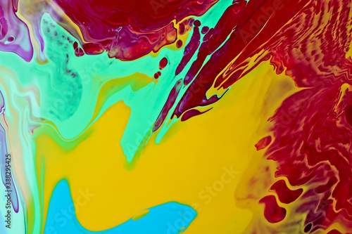 Multicolored bright abstract background. Make up concept.Beautiful stains of liquid nail laquers.Fluid art pour painting technique.Horizontal banner can be used as backdrop for chat.