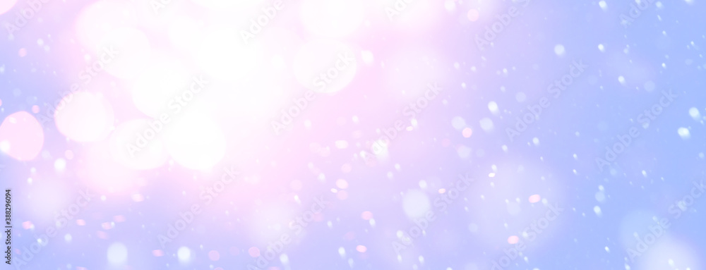 holiday illumination and sparklers - christmas garland bokeh lights over blue background holiday illumination and sparklers - christmas garland bokeh lights over blue background