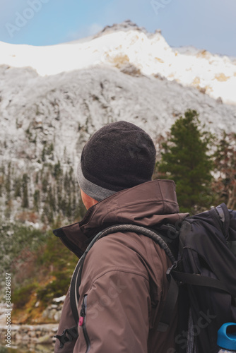 Wallpaper Mural Wonderful views of the rocky mountains, covered with snow, with traveling tourists Torontodigital.ca