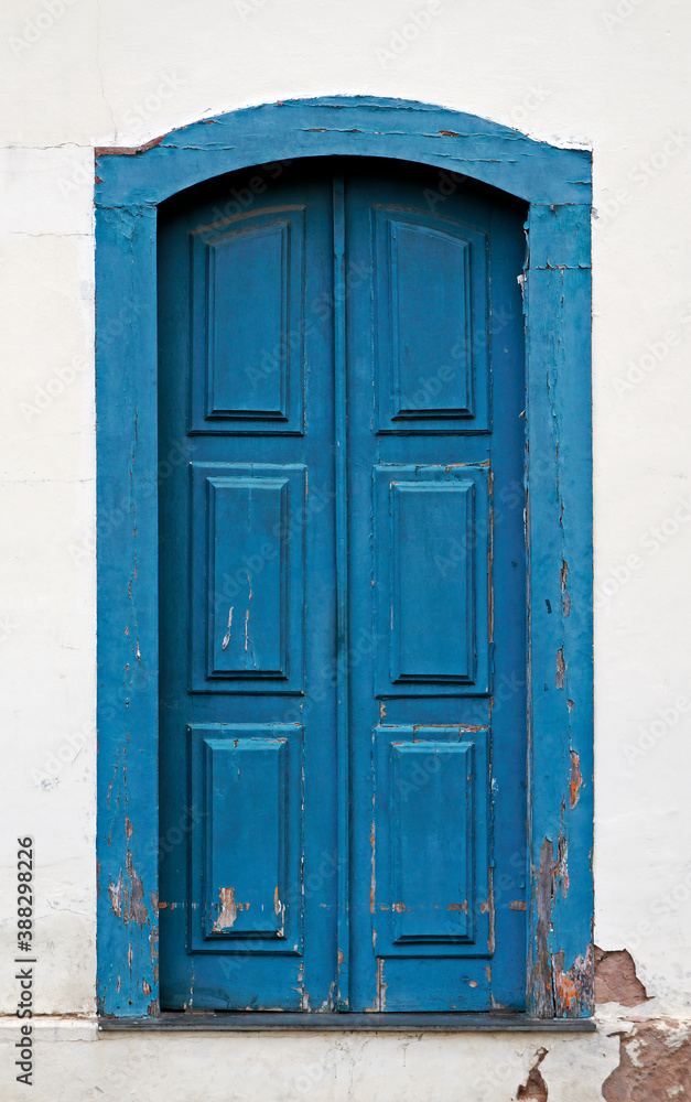 Ancient colonial door in historical city of Ouro Preto, Brazil 