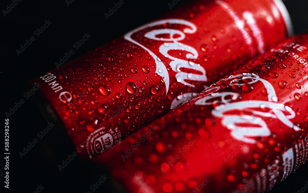 Coca Cola bottle with splashes of water on a black background and water  drops Stock Photo | Adobe Stock