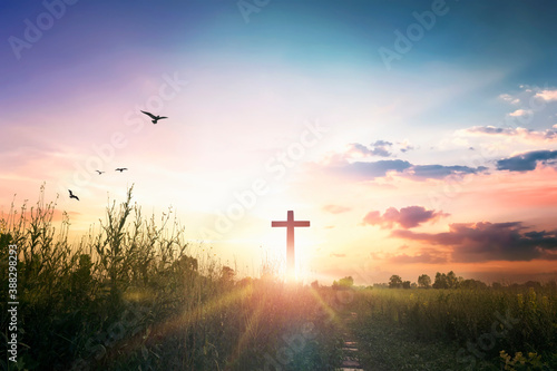 Easter concept: Concept : cross on sunset sky background