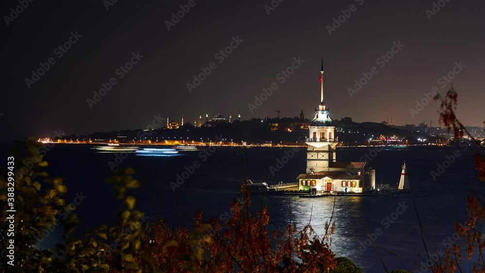 Maiden Tower (Kiz Kulesi), boats on Bosphorus, and Historical Peninsula with mosques. Evening panorama clip taken in Uskudar region, Istanbul, Turkey. Time lapse. Maiden Tower (Kiz Kulesi), boats on Bosphorus, and Historical Peninsula with mosques. Evening panorama clip taken in Uskudar region, Istanbul, Turkey. Time lapse.