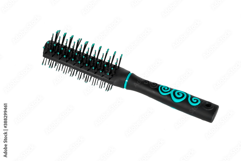 Massage plastic comb black isolate on a white background. Massage plastic comb black isolate on a white background.