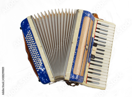 Blue piano accordion, isolated on a white background