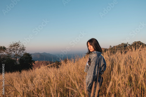 Lifestyle Beautiful . women in the meadow and the sunset light © NARONG
