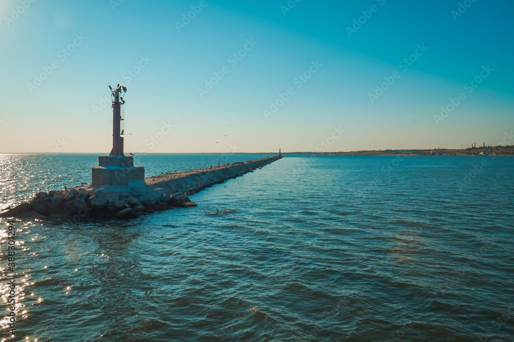 A statue on the breakwater at the entrance to the Berdyansk port.