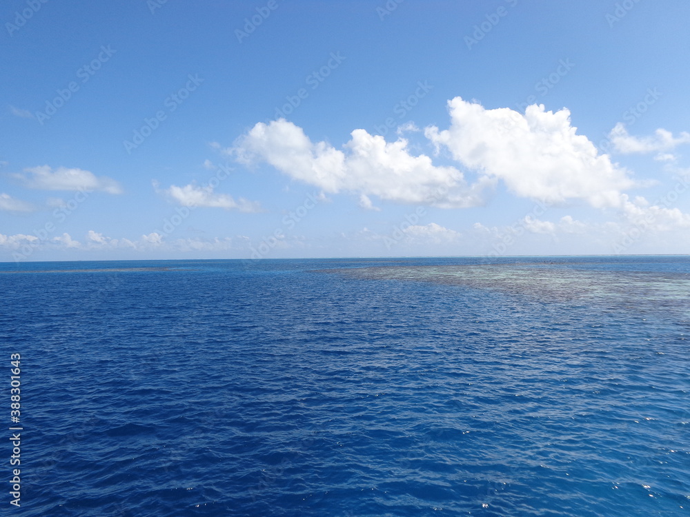 The stunning sunsets, beaches, coral reefs and huts on the Belize Islands in the Caribbean Sea