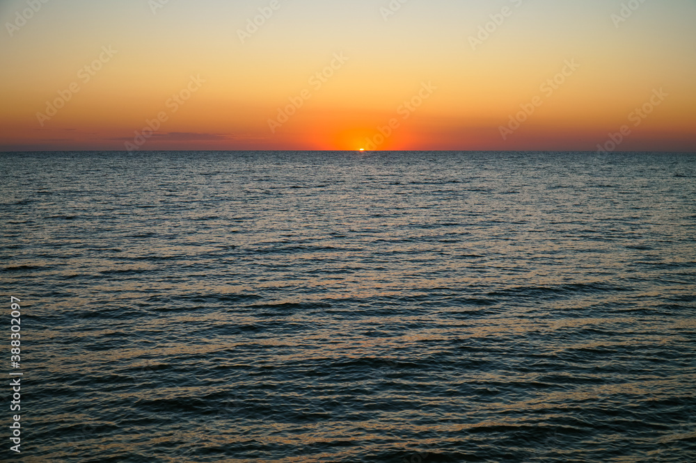 Sun rising over the sea. Dawn over the Sea of Azov. Sun rising over the sea. Dawn over the Sea of Azov.