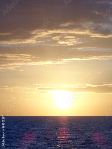 The stunning sunsets, beaches, coral reefs and huts on the Belize Islands in the Caribbean Sea © ChrisOvergaard