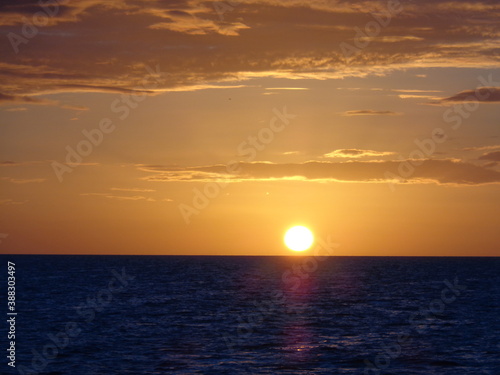 The stunning sunsets  beaches  coral reefs and huts on the Belize Islands in the Caribbean Sea