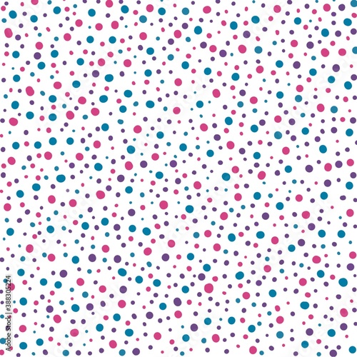 Pink  purple and blue dots of different sizes on a white background abstract pattern. 