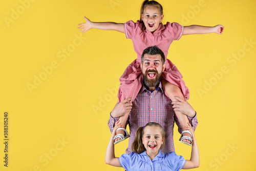 children having fun with their daddy, fun together