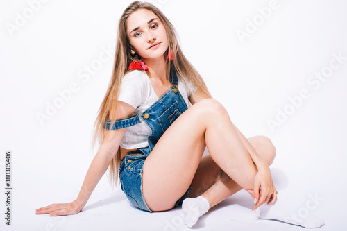 young pretty teenage girl posing cheerful on white background isolated, lifestyle people concept