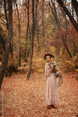 model autumn on a walk with a fox