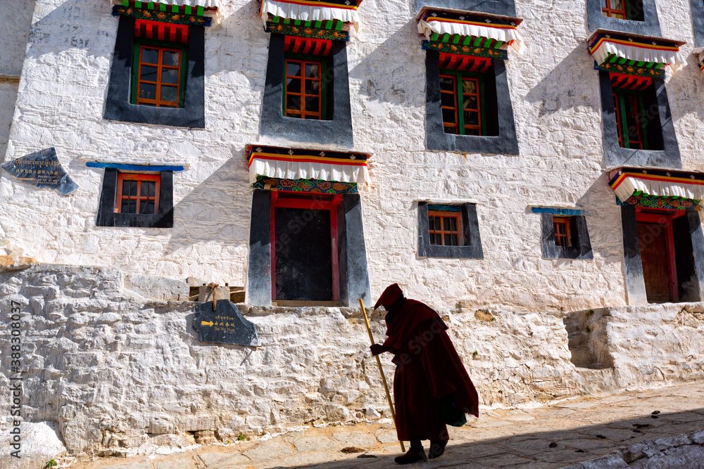Silhouette of monk in Drepung monastery, Lhasa, Tibet