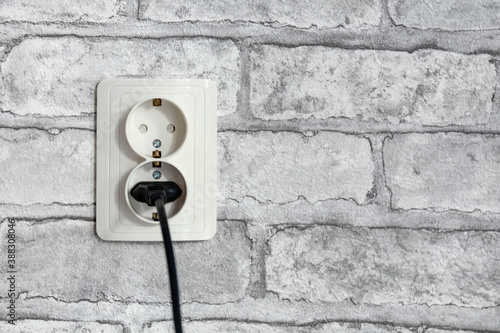 European wall socket with plug connected