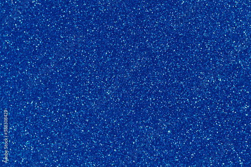 Blue glitter bokeh circle glow blurred and blur abstract. Glittering shimmer bright luxury . White and silver glisten twinkle for texture wallpaper and background backdrop.
