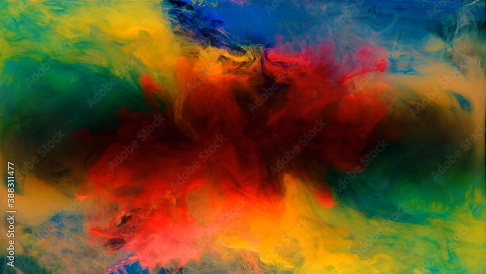 Color drops in water , abstract color mix , drop of ink color mix paint falling on background,