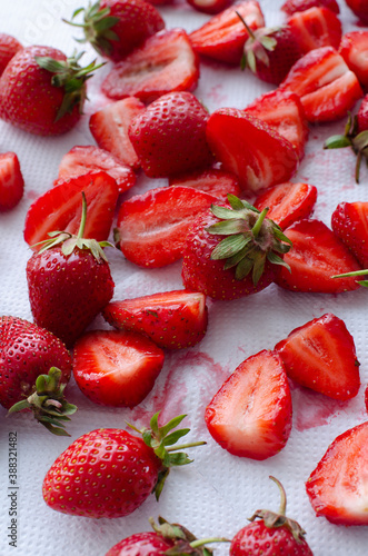 red raw fresh strawberries on white background, close view 