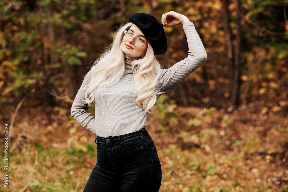 Close up portrait of pretty blonde woman wearing trendy casual outfit Close up portrait of pretty blonde woman wearing trendy casual outfit