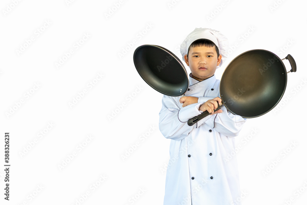 portrait asia, healthy boy in a kitchen white uniform and chef hat holding two pan (equipment for cooking) isolated on white background with clipping path portrait asia, healthy boy in a kitchen white uniform and chef hat holding two pan (equipment for cooking) isolated on white background with clipping path