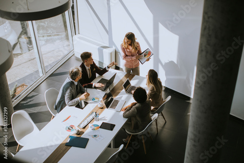 Multiethnic business people working together in the office photo