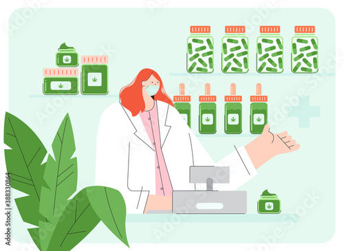 Female pharmacist with face mask shows medical marijuana, cannabinoids medicinal products in Coronavirus circumstances. CBD oils, pill, and cream bottles in the pharmacy store.