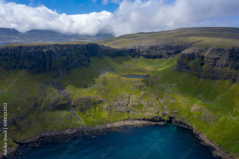 Fototapeta premium Hvannhagi and Lake Hvannavatn, Suðuroy, Faroe Islands.