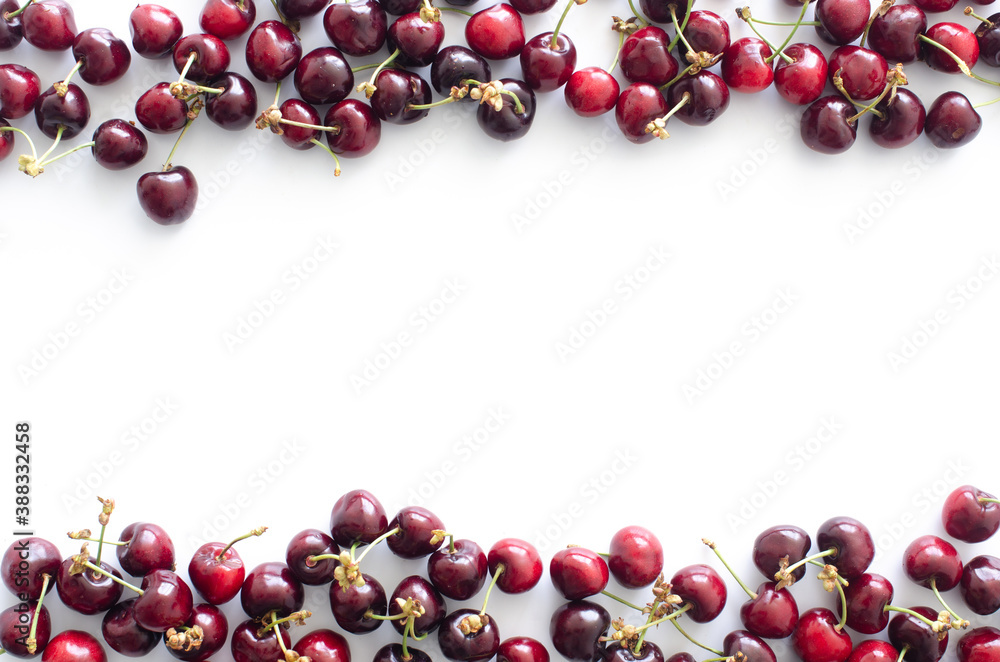 red raw fresh cherries on white background, close view red raw fresh cherries on white background, close view
