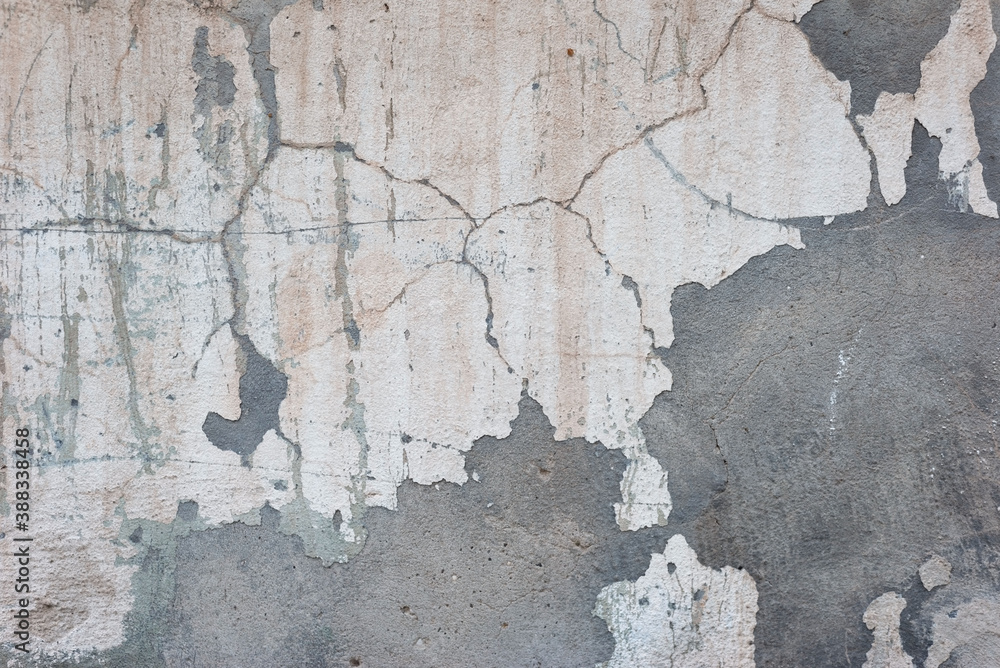 Obraz premium texture of street decorative plaster with cracks, warm shades