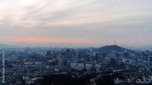 Time Lapse Beautiful sunrise of Seoul,cityscapse at inwangsan mountain in South Korea. photo