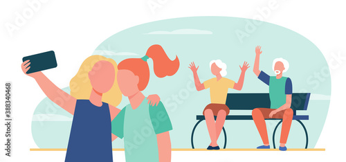 Two girls taking selfie together. Cheerful grandparents waving and posing in background flat vector illustration. Leisure, family, generation concept for banner, website design or landing web page