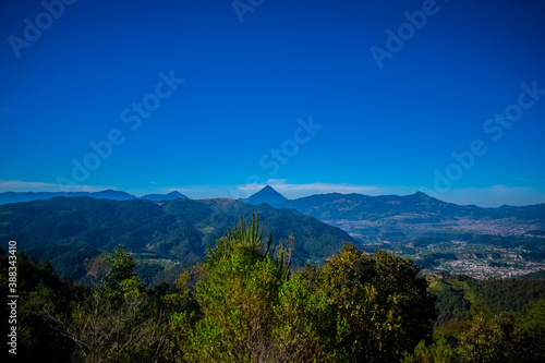 pasaje de mirador al valle de cajola y pueblo con vista al volcán de santa maría  photo