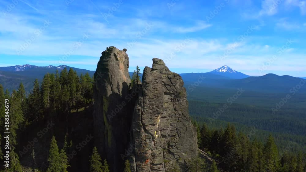 Bessie Rock in the southern Oregon Cascades, A volcanic feature, viewed with an aerial perspective showing the beautiful landscape and peaks in the background Bessie Rock in the southern Oregon Cascades, A volcanic feature, viewed with an aerial perspective showing the beautiful landscape and peaks in the background