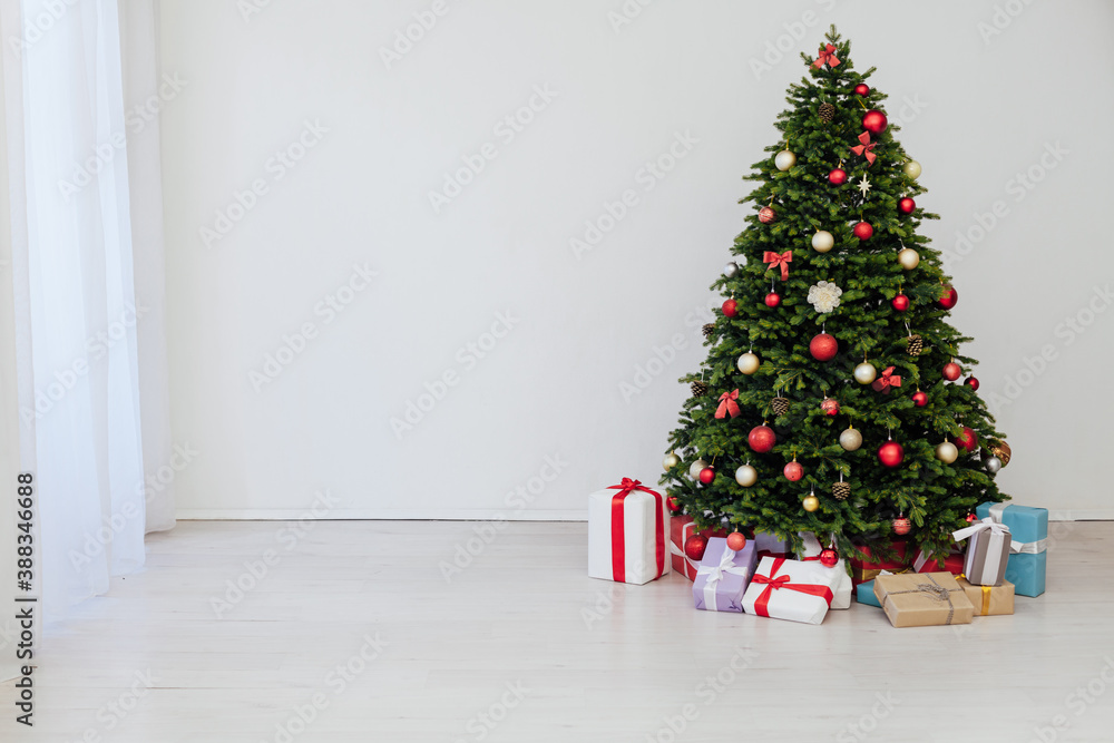 Christmas tree pine with gifts for the new year decor background place for inscription
